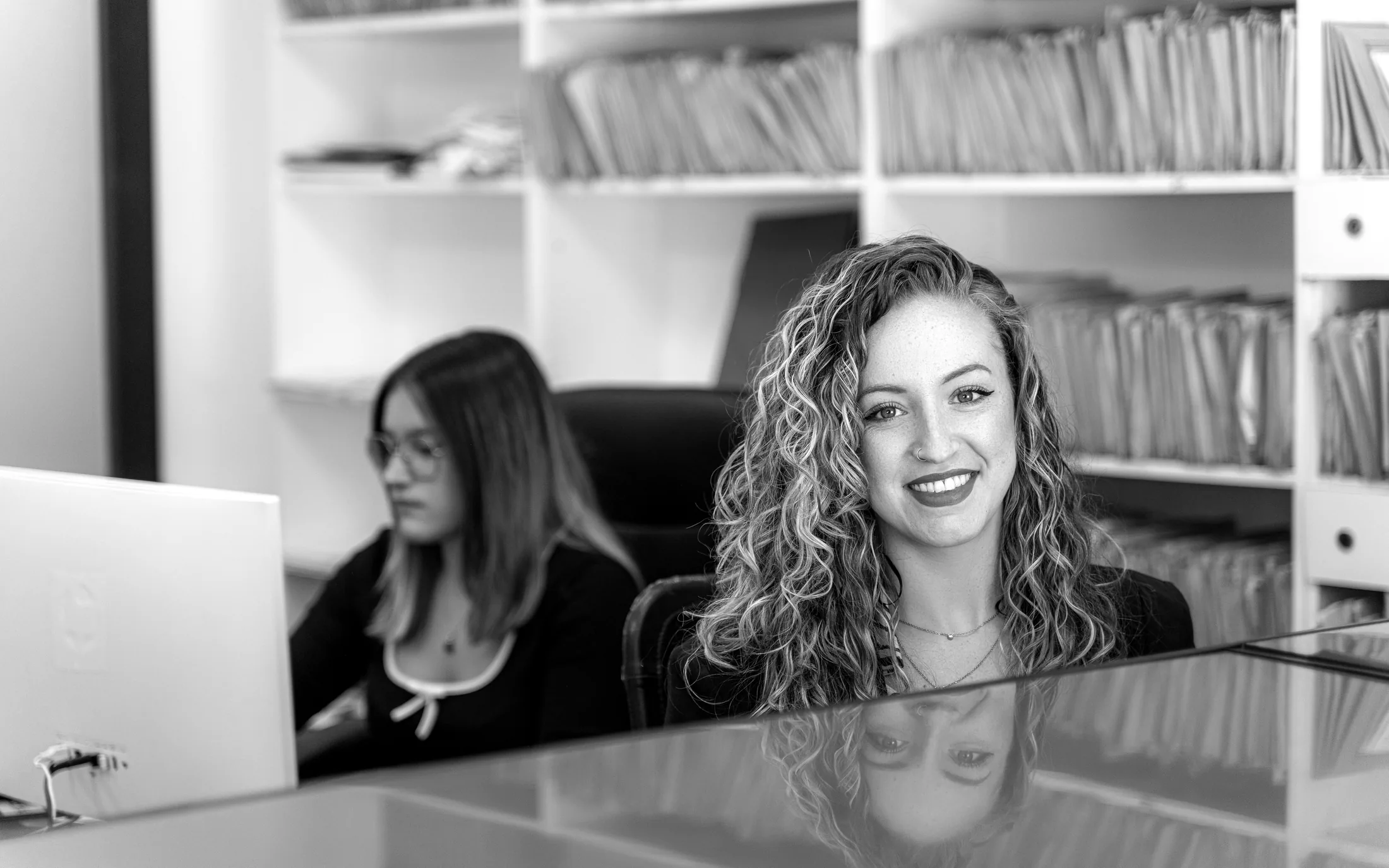 Black-and-white claims management workspace with patient records